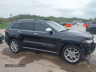 2015 Jeep Grand Cherokee Summit z VIN 1C4RJFJT0FC674494, wystawiony jako IAAI lot #42056835 z przebiegiem 143 969 mil mil oraz . Historia ofert i sprzedaży dostępna na DreamBid. Obrazek 14.