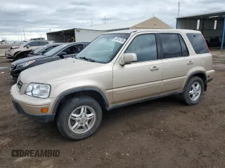 2001 Honda CR-V SE z VIN JHLRD18701S000852, wystawiony jako Copart lot #59744795 z przebiegiem 165 062 mil mil oraz Czysty tytuł • Clean title. Historia ofert i sprzedaży dostępna na DreamBid. Obrazek 1.