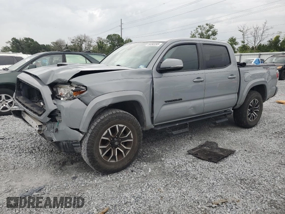 2020 Toyota Tacoma SR5 with VIN 3TMAZ5CNXLM121344, listed as a Copart auction lot 59393395 with 69,902 mi miles and Salvage title. Bid and sale history available at DreamBid. Image 1.