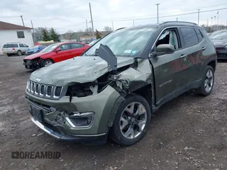2020 Jeep Compass Limited with VIN 3C4NJDCBXLT123657, listed as a IAAI auction lot 42004527 with 99,669 mi miles and . Bid and sale history available at DreamBid. Image 17.