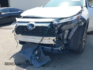 2024 Toyota RAV4 Hybrid XLE Premium with VIN JTMB6RFV9RJ063328, listed as a IAAI auction lot 42433233 with 9,874 mi miles and . Bid and sale history available at DreamBid. Image 6.