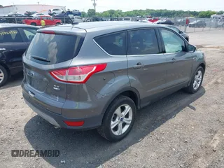 2014 Ford Escape SE with VIN 1FMCU9GX1EUE21729, listed as a IAAI auction lot 42475113 with 116,050 mi miles and . Bid and sale history available at DreamBid. Image 4.