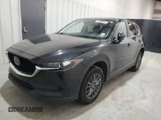2021 Mazda CX-5 Touring with VIN JM3KFBCM5M0343577, listed as a Copart auction lot 52411005 with 70,372 mi miles and Clean Title. Bid and sale history available at carsss.com. Image 1.