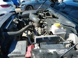 2019 Ram 1500 Big Horn z VIN 1C6SRFFTXKN668534, wystawiony jako IAAI lot #43486897 z przebiegiem 102 972 mil mil oraz . Historia ofert i sprzedaży dostępna na DreamBid. Obrazek 19.