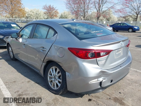 2014 Mazda 3 i Grand Touring with VIN JM1BM1W72E1196080, listed as a IAAI auction lot 42002800 with 88,772 mi miles. Bid and sale history available at carsss.com. Image 3.
