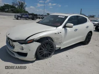 2019 Maserati Levante S z VIN ZN661YUL7KX310553, wystawiony jako Copart lot #52947585 z przebiegiem Nie podano mil oraz Szkoda całkowita • Salvage title. Historia ofert i sprzedaży dostępna na DreamBid. Obrazek 1.