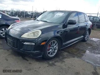 2009 Porsche Cayenne GTS with VIN WP1AD29P09LA60715, listed as a IAAI auction lot 41827145 with 261,831 mi miles. Bid and sale history available at carsss.com. Image 2.