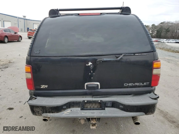 2003 Chevrolet Tahoe Z71 with VIN 1GNEK13T03R124255, listed as a Copart auction lot 42002945 with 205,965 mi miles and Salvage Title. Bid and sale history available at carsss.com. Image 6.