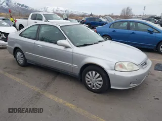 1999 Honda Civic EX with VIN 1HGEJ8146XL082023, listed as a IAAI auction lot 41495154 with 218,491 mi miles. Bid and sale history available at carsss.com. Image 1.