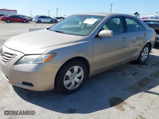 2007 Toyota Camry CE with VIN 4T1BE46K97U180782, listed as a IAAI auction lot 42046103 with 171,607 mi miles. Bid and sale history available at carsss.com. Image 2.