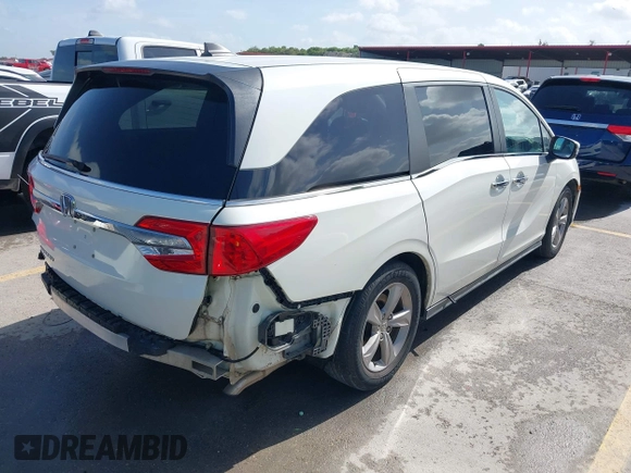 2018 Honda Odyssey EX with VIN 5FNRL6H57JB100035, listed as a IAAI auction lot 42582758 with 88,585 mi miles and . Bid and sale history available at DreamBid. Image 4.