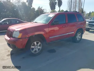2010 Jeep Grand Cherokee Laredo with VIN 1J4PS4GK4AC121454, listed as a IAAI auction lot 41759966 with 69,390 mi miles. Bid and sale history available at carsss.com. Image 2.