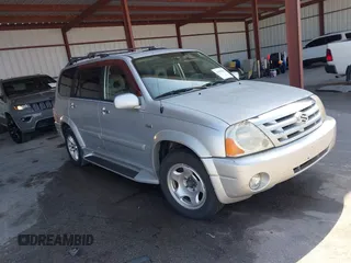 2004 Suzuki XL7 LX z VIN JS3TX92V744113482, wystawiony jako IAAI lot #41900863 z przebiegiem 124 161 mil mil oraz . Historia ofert i sprzedaży dostępna na DreamBid. Obrazek 1.
