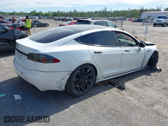 2020 Tesla Model S Long Range with VIN 5YJSA1E2XLF360260, listed as a IAAI auction lot 41241778 with 141,594 mi miles. Bid and sale history available at carsss.com. Image 4.