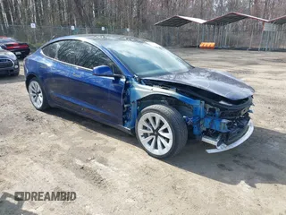 2022 Tesla Model 3 with VIN 5YJ3E1EA7NF188417, listed as a IAAI auction lot 41885623 with 105,457 mi miles and . Bid and sale history available at DreamBid. Image 1.
