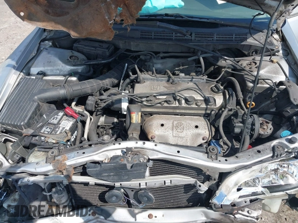 2002 Honda Accord LX z VIN JHMCG56462C005400, wystawiony jako IAAI lot #41893400 z przebiegiem Nie podano mil oraz . Historia ofert i sprzedaży dostępna na DreamBid. Obrazek 10.