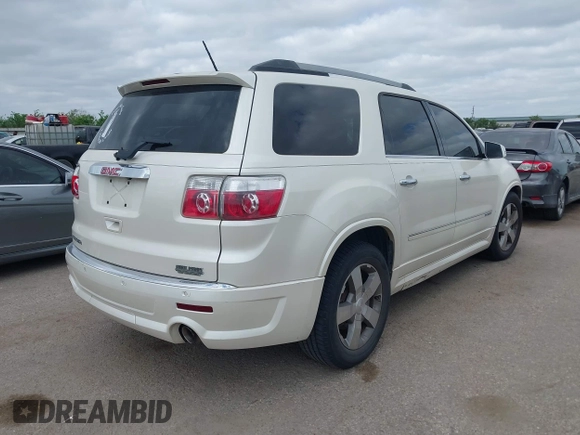 2011 GMC Acadia Denali with VIN 1GKKRTED3BJ389701, listed as a IAAI auction lot 42015288 with 139,996 mi miles and . Bid and sale history available at DreamBid. Image 4.