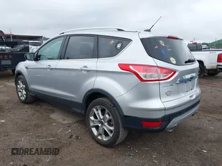 2015 Ford Escape Titanium with VIN 1FMCU0JX7FUB60418, listed as a IAAI auction lot 42485107 with 82,172 mi miles and . Bid and sale history available at DreamBid. Image 3.
