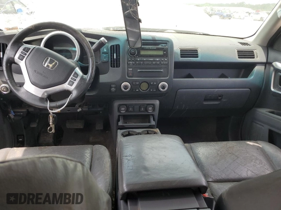 2007 Honda Ridgeline RTL with VIN 2HJYK16547H533699, listed as a Copart auction lot 61100115 with 241,366 mi miles and Salvage title. Bid and sale history available at DreamBid. Image 8.