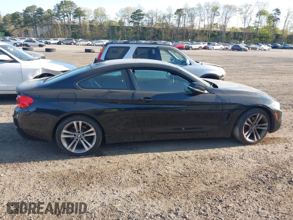 2014 BMW 4 Series 428i xDrive with VIN WBA3N9C55EF721295, listed as a IAAI auction lot 42139256 with 85,472 mi miles and . Bid and sale history available at carsss.com. Image 13.
