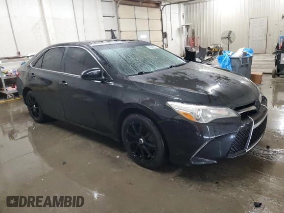 2015 Toyota Camry XLE with VIN 4T1BF1FK8FU050096, listed as a Copart auction lot 54348005 with 216,024 mi miles and Salvage Title. Bid and sale history available at carsss.com. Image 4.