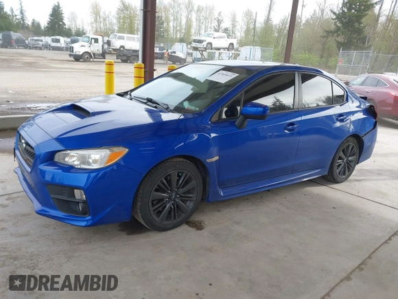 2015 Subaru WRX Premium with VIN JF1VA1D60F8817802, listed as a IAAI auction lot 42009071 with 82,464 mi miles and . Bid and sale history available at DreamBid. Image 2.