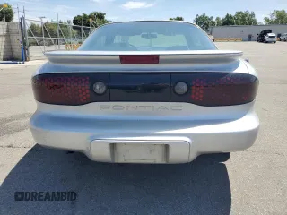 2000 Pontiac Firebird Firebird z VIN 2G2FS22K5Y2116047, wystawiony jako Copart lot #58234695 z przebiegiem 155 876 mil mil oraz Tytuł czysty. Historia ofert i sprzedaży dostępna na DreamBid. Obrazek 6.