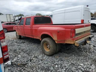1996 Ford F-350 with VIN 1FTJW35F3TEB59586, listed as a Copart auction lot 79329304 with 199,054 mi miles and Salvage title. Bid and sale history available at DreamBid. Image 2.