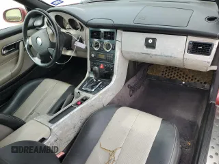 1999 Mercedes-Benz SLK-Class with VIN WDBKK47F0XF132802, listed as a Copart auction lot 69818544 with 123,026 mi miles and Salvage Title. Bid and sale history available at carsss.com. Image 8.