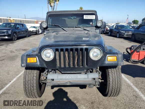 2005 Jeep Wrangler Rubicon with VIN 1J4FA69SX5P343826, listed as a Copart auction lot 69074374 with 179,610 mi miles and Salvage Title. Bid and sale history available at carsss.com. Image 5.