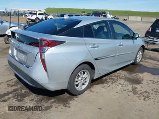 2018 Toyota Prius Two with VIN JTDKARFU6J3554096, listed as a IAAI auction lot 41856090 with 129,873 mi miles. Bid and sale history available at carsss.com. Image 4.