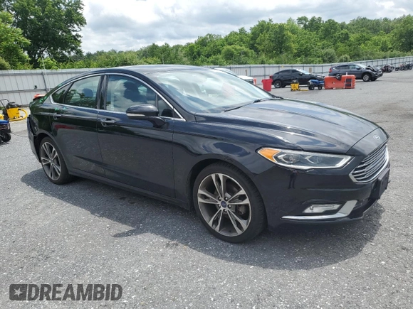 2017 Ford Fusion Titanium z VIN 3FA6P0K92HR192881, wystawiony jako Copart lot #61190515 z przebiegiem 109 834 mil mil oraz Szkoda całkowita • Salvage title. Historia ofert i sprzedaży dostępna na DreamBid. Obrazek 4.