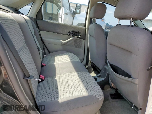 2006 Ford Focus S z VIN 1FAFP34N26W145565, wystawiony jako Copart lot #60091675 z przebiegiem 251 850 mil mil oraz Szkoda całkowita • Salvage title. Historia ofert i sprzedaży dostępna na DreamBid. Obrazek 10.