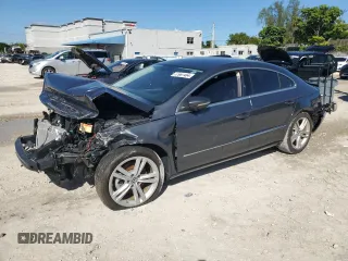 2015 Volkswagen CC R-Line with VIN WVWBN7AN0FE824699, listed as a Copart auction lot 77967484 with 73,800 mi miles and Salvage Title. Bid and sale history available at carsss.com. Image 1.