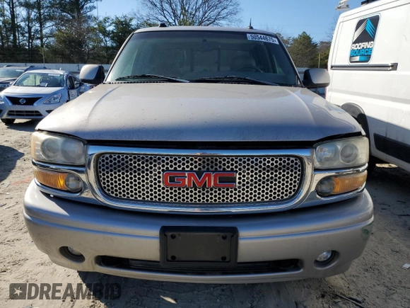2005 GMC Sierra Denali z VIN 2GTEK63N551145668, wystawiony jako Copart lot #50544675 z przebiegiem Nie podano mil oraz Tytuł czysty. Historia ofert i sprzedaży dostępna na DreamBid. Obrazek 5.