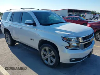 2018 Chevrolet Tahoe LT with VIN 1GNSCBKC7JR101043, listed as a IAAI auction lot 42192481 with 152,831 mi miles and . Bid and sale history available at DreamBid. Image 1.