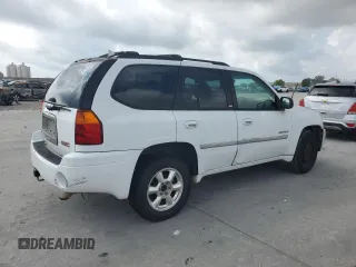 2006 GMC Envoy SLE z VIN 1GKDS13S462144683, wystawiony jako Copart lot #58277565 z przebiegiem Nie podano mil oraz Czysty tytuł • Clean title. Historia ofert i sprzedaży dostępna na DreamBid. Obrazek 3.