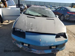 1994 Chevrolet Camaro z VIN 2G1FP22S1R2218727, wystawiony jako Copart lot #80922944 z przebiegiem 181 616 mil mil oraz Szkoda całkowita • Salvage title. Historia ofert i sprzedaży dostępna na DreamBid. Obrazek 5.