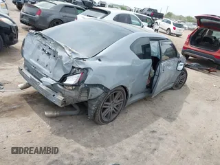 2013 Scion tC with VIN JTKJF5C7XD3046764, listed as a IAAI auction lot 41881930 with 87,701 mi miles. Bid and sale history available at carsss.com. Image 4.