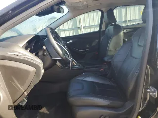 2016 Ford Focus Titanium with VIN 1FADP3J22GL201721, listed as a Copart auction lot 50633795 with 29,801 mi miles and Salvage title. Bid and sale history available at DreamBid. Image 7.