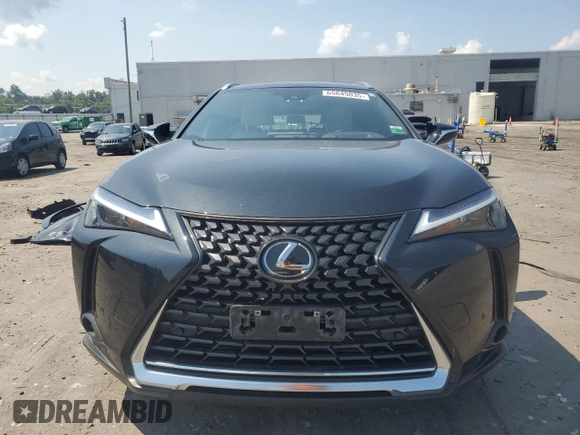 2023 Lexus UX 250h Premium с VIN JTHP9JBHXP2070096, выставлен на аукционе Copart как лот 65645035 с пробегом 9 748 миль миль и Списание • Salvage title. История ставок и продаж доступна на DreamBid. Изображение 5.