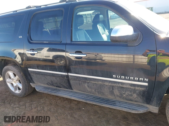 2012 Chevrolet Suburban LTZ with VIN 1GNSKKE74CR324578, listed as a IAAI auction lot 42129334 with 182,655 mi miles. Bid and sale history available at carsss.com. Image 13.