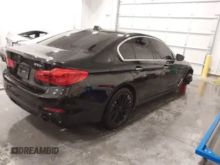 2018 BMW 5 Series 530i with VIN WBAJA5C52JWA37569, listed as a IAAI auction lot 41240799 with 80,116 mi miles and . Bid and sale history available at DreamBid. Image 4.
