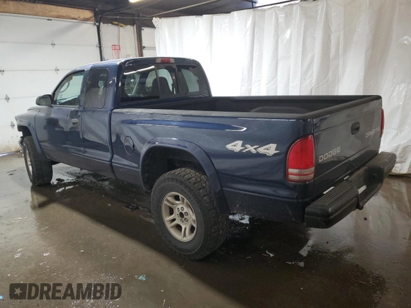 2004 Dodge Dakota Sport with VIN 1D7HG32N54S525290, listed as a Copart auction lot 77141804 with 217,012 mi miles and Salvage Title. Bid and sale history available at carsss.com. Image 2.