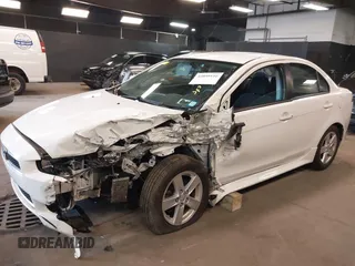 2014 Mitsubishi Lancer SE with VIN JA32V2FW1EU018927, listed as a IAAI auction lot 42059116 with 148,874 mi miles and . Bid and sale history available at carsss.com. Image 6.