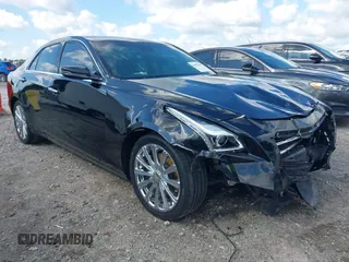 2019 Cadillac CTS Luxury AWD z VIN 1G6AX5SX8K0135286, wystawiony jako IAAI lot #41975314 z przebiegiem 77 938 mil mil oraz . Historia ofert i sprzedaży dostępna na DreamBid. Obrazek 1.