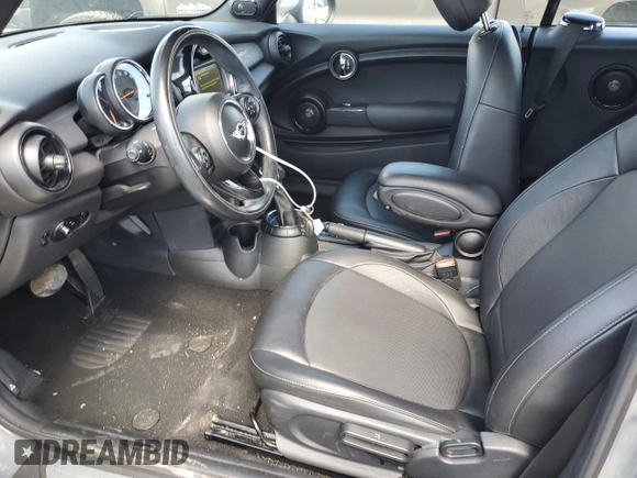 2016 MINI Convertible with VIN WMWWG5C57G3C19380, listed as a Copart auction lot 50645324 with 76,396 mi miles and Salvage title. Bid and sale history available at DreamBid. Image 7.