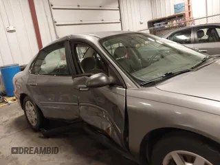 2006 Ford Taurus SE with VIN 1FAFP53U86A113947, listed as a IAAI auction lot 41753927 with 203,867 mi miles. Bid and sale history available at carsss.com. Image 13.