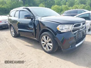 2013 Dodge Durango Crew z VIN 1C4RDJDG3DC685995, wystawiony jako IAAI lot #42490067 z przebiegiem 205 806 mil mil oraz . Historia ofert i sprzedaży dostępna na DreamBid. Obrazek 1.