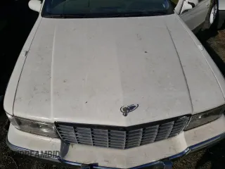 1995 Cadillac Fleetwood z VIN 1G6DW52P2SR700272, wystawiony jako Copart lot #77906824 z przebiegiem Nie podano mil oraz Szkody całkowita. Historia ofert i sprzedaży dostępna na DreamBid. Obrazek 11.